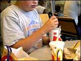 Child eating junk food